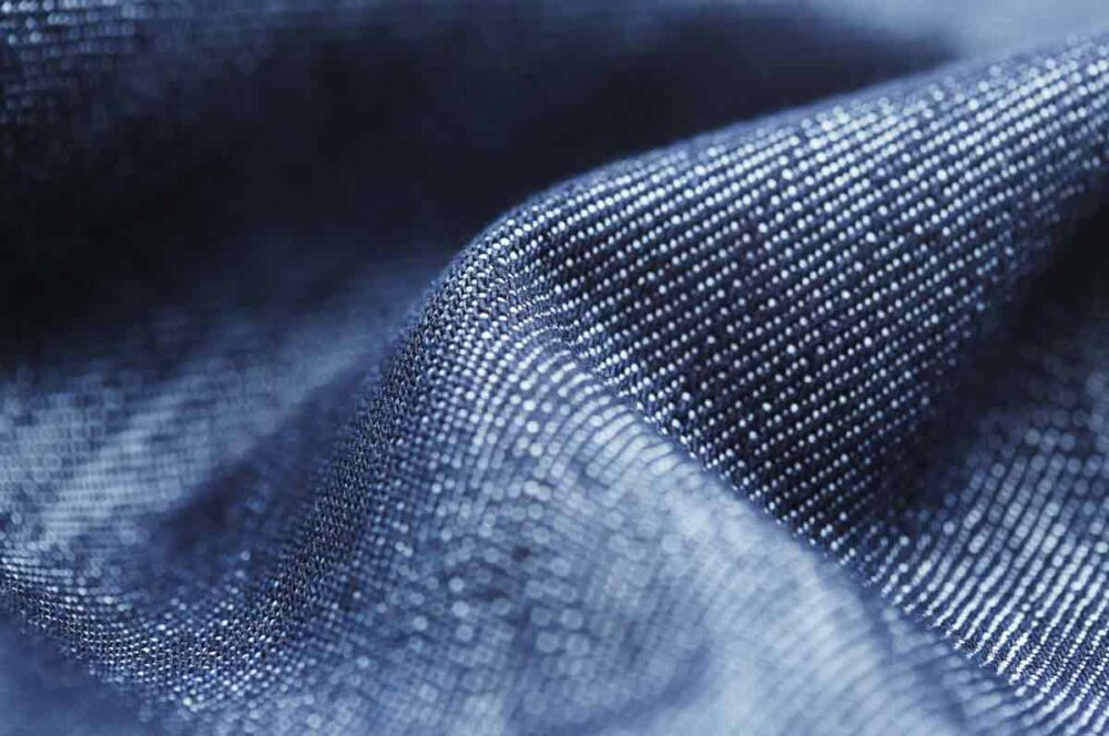 Denim Jeans Fabric Texture Or Denim Jeans Background With Seam For Beauty  Clothing. Fashion Business Design And Industrial Construction Idea Concept.  Stock Photo, Picture and Royalty Free Image. Image 88998694.